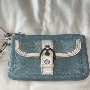 Baby blue coach wristlet. Barley used!